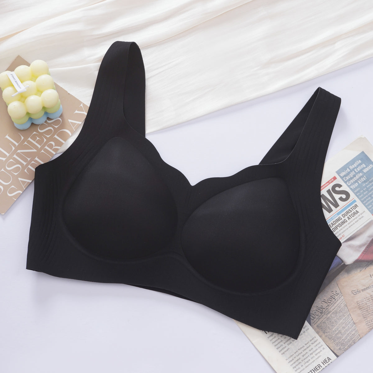 Side view of black wireless seamless contour bra showing arched lifting underband