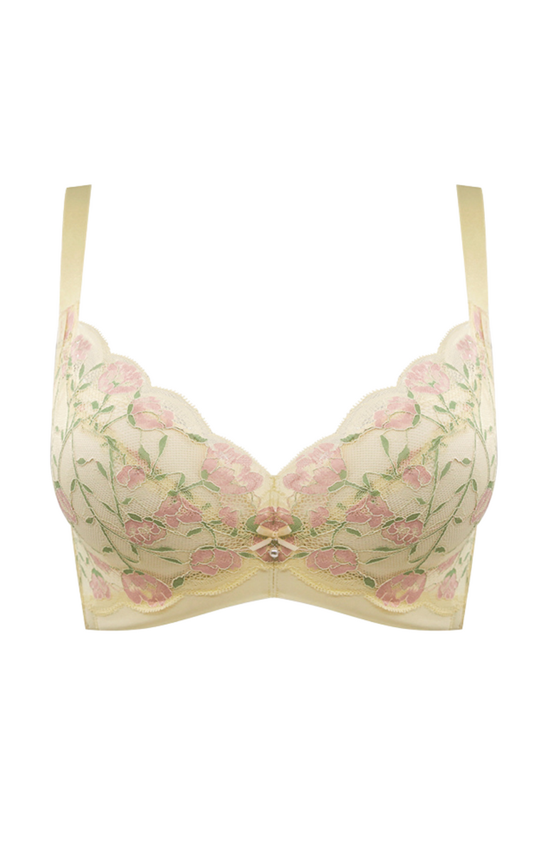 Yellow lace bra with pastel floral patterns, presented on a neutral background.