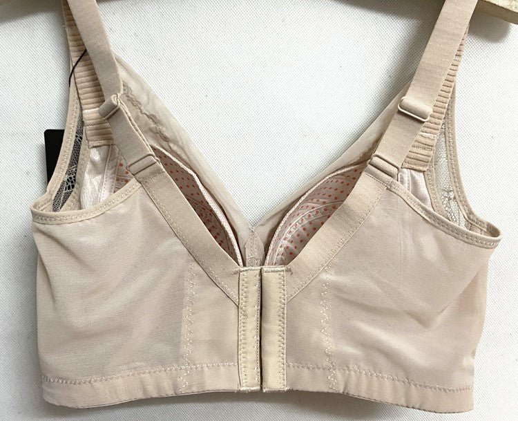 Back View of Beige Bra with Hook Closure – The back of the beige bra, showing the hook-and-eye closure and adjustable wide straps.
