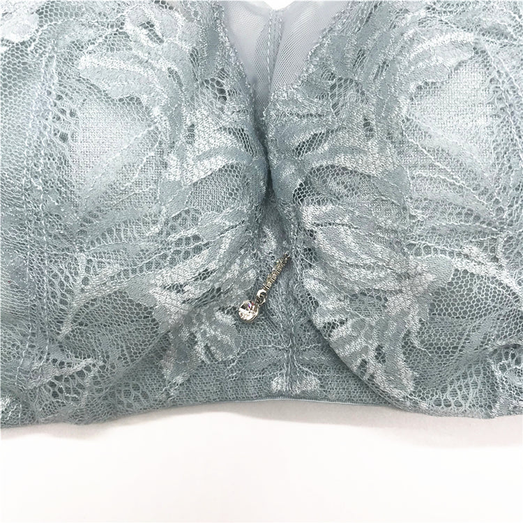 Blue Bra Fabric and Stitching Detail – Close-up shot focusing on the fabric texture and seam work on the blue bra.