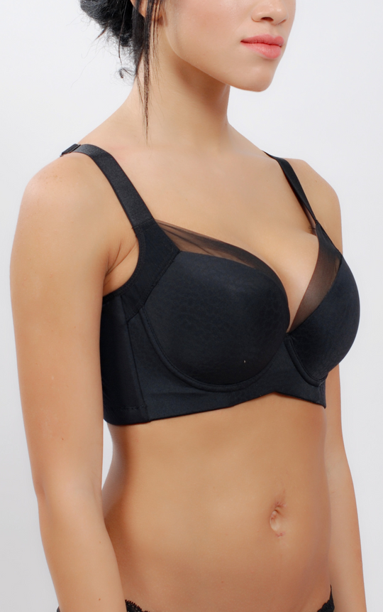Side angle showcasing the bra’s seamless design, smooth back bands, and structured underwire support.