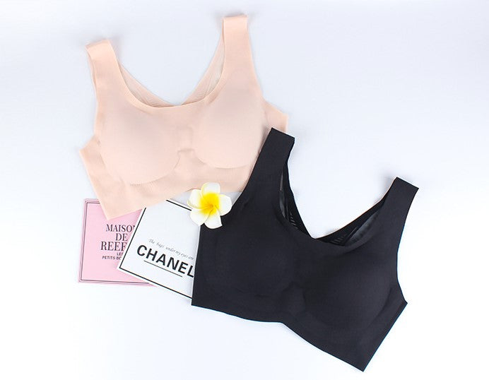 Display of a beige and black seamless wireless bra, showcasing the available color options in breathable, comfortable cotton fabric.