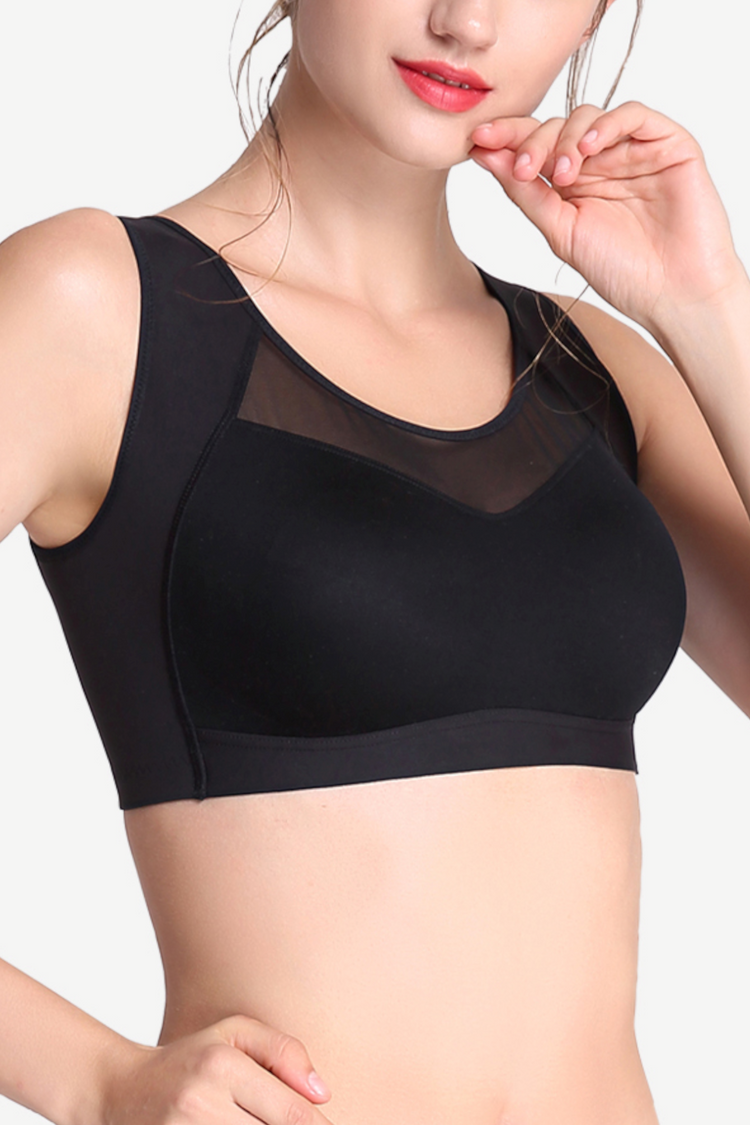 Side view of a black wireless workout bra showcasing wide sidebands for contouring and a snug fit.