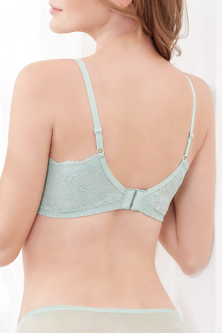 Back view showcasing the back-smoothing effect of the green wireless bra