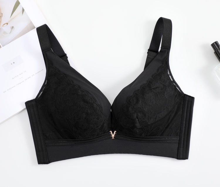 Front view of a black wireless lace push-up bra, featuring intricate lace detailing and a V-shaped front design for added elegance.
