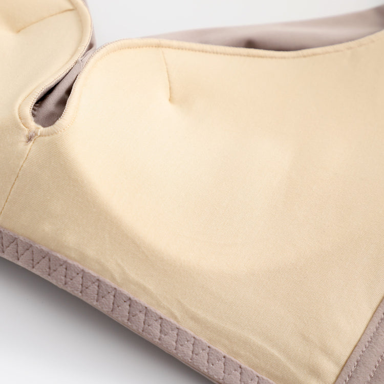 Close-up of the interior cotton lining of a pink wireless push-up bra, showcasing its breathable and comfortable fabric for all-day wear.